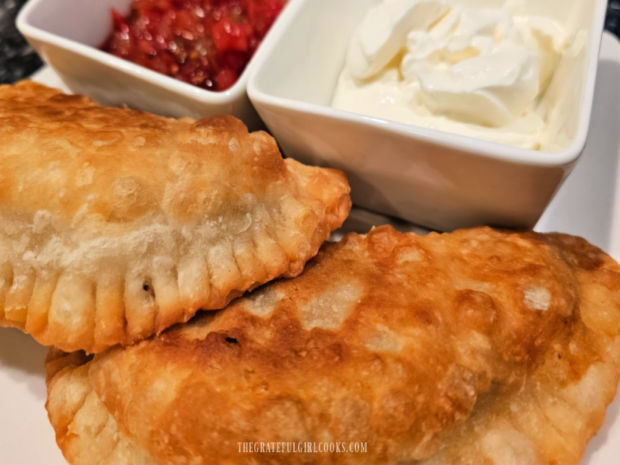 A couple of the empanadas, ready to be eaten.