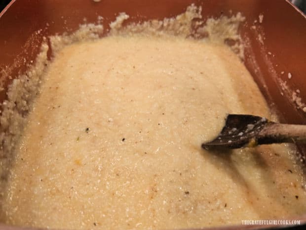 Grits are seasoned to taste with salt and black pepper.