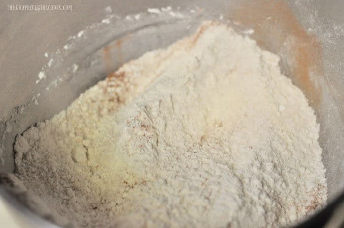 Dry ingredients for the muffins are combined in a bowl.