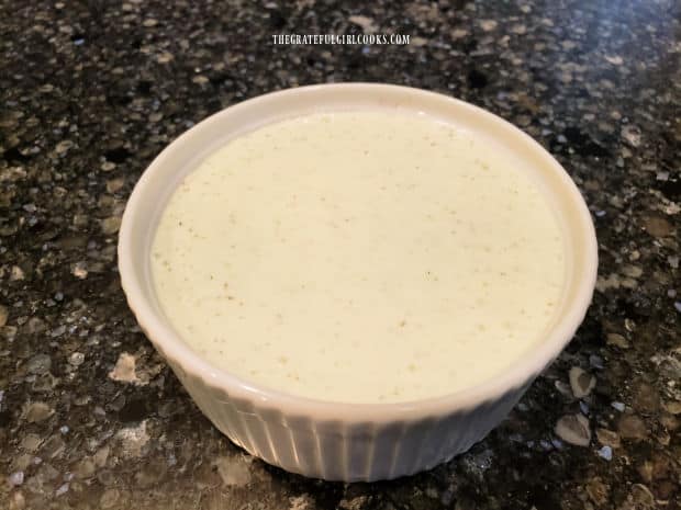 A small bowl of freshly made homemade Greek Tzatziki Sauce, ready to be enjoyed.