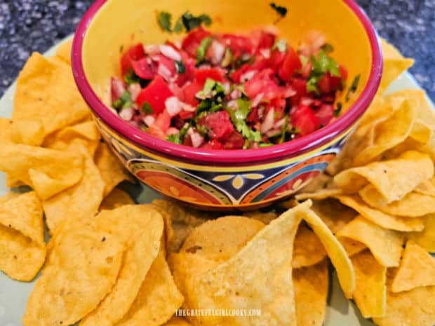 Homemade Pico de Gallo is served as an appetizer with tortilla chips.