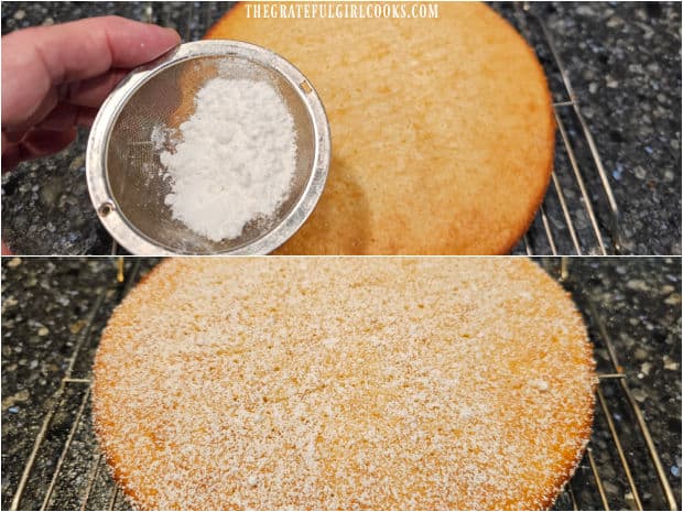 Powdered sugar is lightly sifted over the surface of the cake before serving.