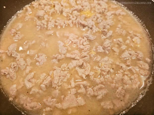 Turkey Veggie Orzo Skillet - The Grateful Girl Cooks! Uncooked orzo pasta and more chicken broth is added to skillet.