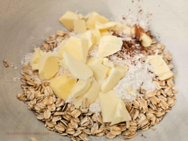 Topping mixture is made by cutting cold butter into oats and flour, etc.