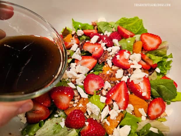 Chicken Strawberry Delight Salad - The Grateful Girl Cooks! Salad dressing is poured over the salad.