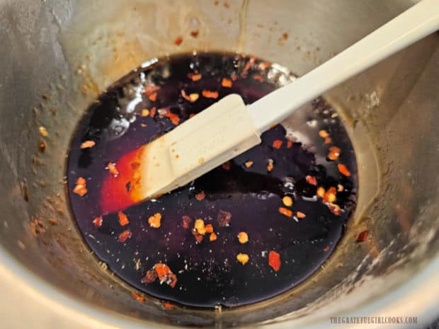 Ingredients for the honey garlic sauce are combined in a small bowl.