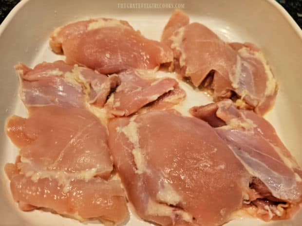Apricot Glazed Chicken Thighs - The Grateful Girl Cooks! Chicken thighs are placed in single layer in a greased baking dish.
