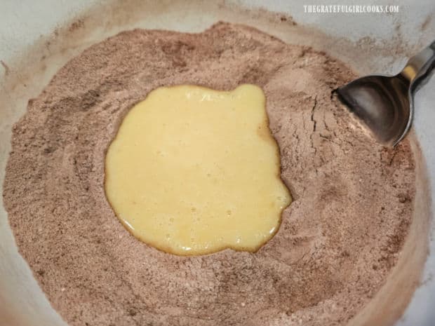 Egg mixture is added to dry ingredients and then stirred to combine.