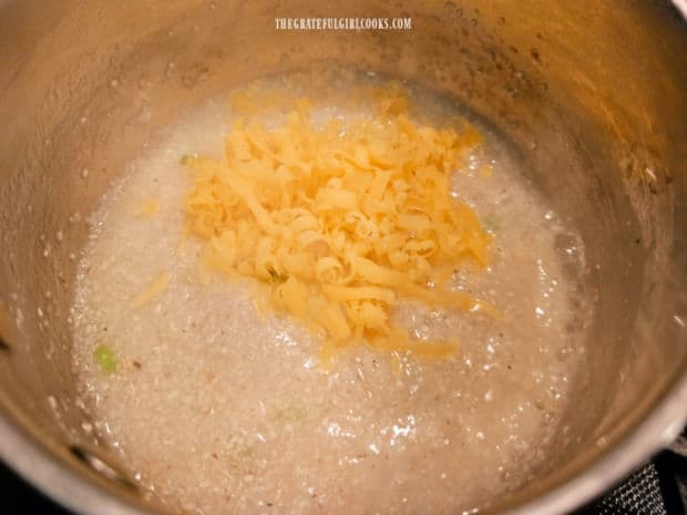 Egg Topped Cheesy Grits - The Grateful Girl Cooks! Grated sharp cheddar cheese is added to the grits.