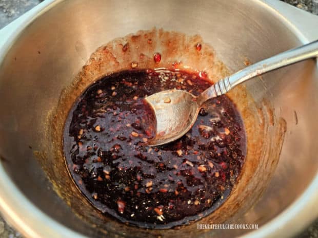 The sauce ingredients are stirred together until they are fully combined.