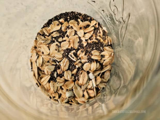 Raspberry Coconut Overnight Oats - The Grateful Girl Cooks! Old-fashioned oats and chia seeds are measured into a pint jar.