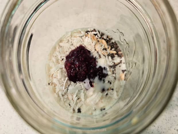 Raspberry Coconut Overnight Oats - The Grateful Girl Cooks! Shredded coconut and a bit of raspberry jam are added to the oats in jar.