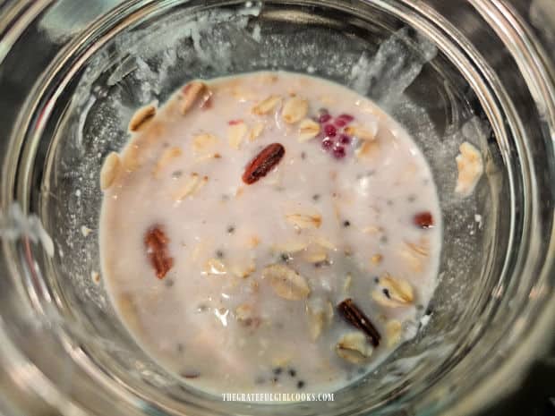 Raspberry Coconut Overnight Oats - The Grateful Girl Cooks! Raspberries are submerged and now the oats are ready for overnight refrigeration.