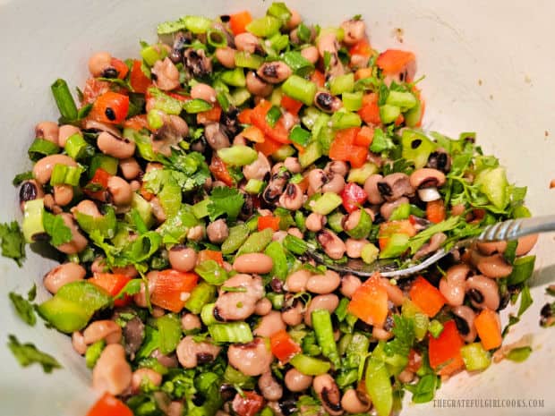 Texas Caviar - The Grateful Girl Cooks! Ingredients for the Texas caviar are stirred until combined.