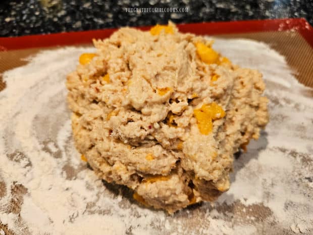 Glazed Peach Scones - The Grateful Girl Cooks! Dough for peach scones is put on a floured surface for shaping.