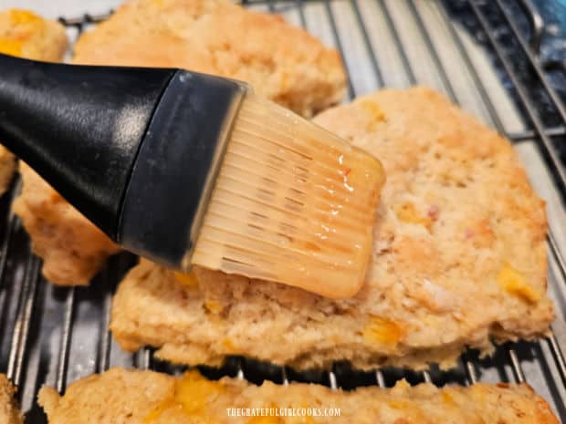 Glazed Peach Scones - The Grateful Girl Cooks! A pastry brush is used to paint on the peach glaze on the cooled scones.